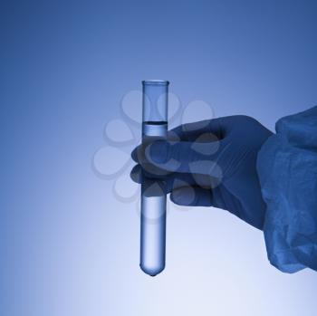 Royalty Free Photo of a Hand Holding a Test Tube