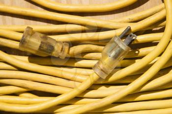 Royalty Free Photo of a Yellow Electric Extension Cord