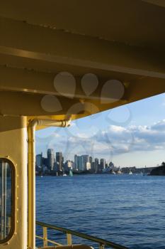 Royalty Free Photo of a View From a Ferryboat of a Harbour and Skyline of Sydney, Australia