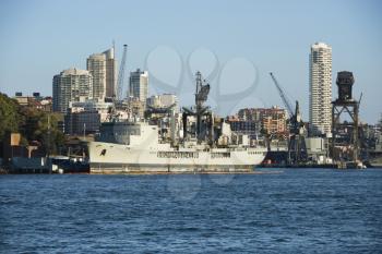 Royalty Free Photo of a Tanker Ship at a Port in Sydney, Australia With View of Buildings