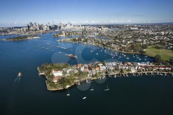 Royalty Free Photo of an Aerial View of Boats in Snails Bay With a View of Downtown Skyline in Sydney, Australia