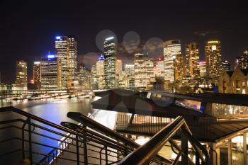 Royalty Free Photo of a Night Cityscape With Buildings and Harbor in Sydney, Australia