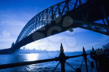 Royalty Free Photo of Sydney Harbour Bridge at Dusk With Distant Sydney Skyline, Australia