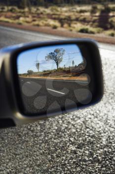 Royalty Free Photo of a Reflection of Rural Australian in a Rear View Mirror