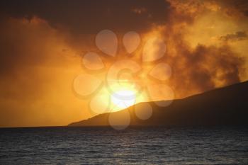 Royalty Free Photo of Maui, Hawaii Sunset With Ocean and Island Mountain