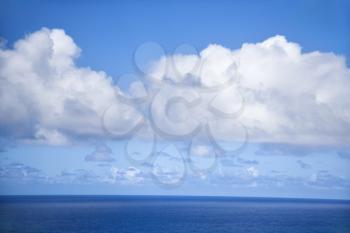 Royalty Free Photo of the Horizon of Pacific Ocean and Blue Sky With Clouds