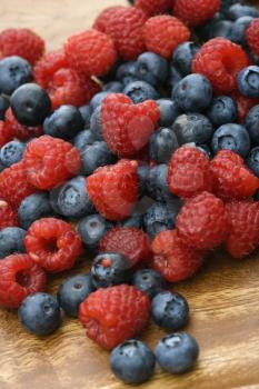 Royalty Free Photo of a Platter of Mixed Blueberries and Raspberries