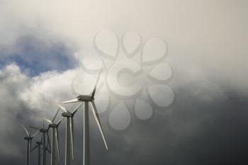 Royalty Free Photo of a Row of Turbines at a Wind Farm