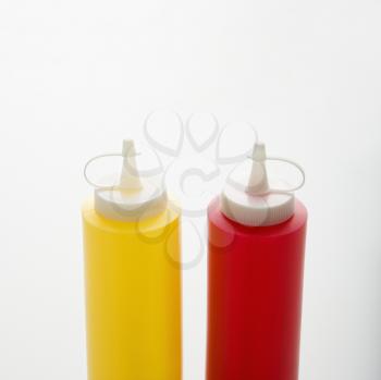 Royalty Free Photo of Plastic Ketchup and Mustard Containers