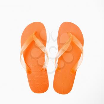 Royalty Free Photo of Orange Plastic Flip Flops