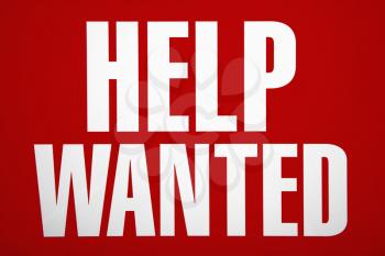 Royalty Free Photo of a Red Help Wanted Sign