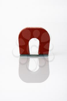 Royalty Free Photo of a Red Magnet