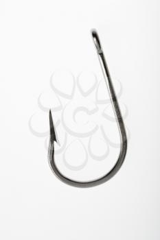Barbed fishing hook against white background.