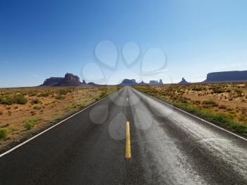 Royalty Free Photo of an Open Road in Scenic Desert Landscape 