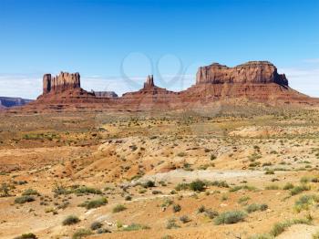 Royalty Free Photo of a Scenic Desert Landscape With Mountains and Mesas