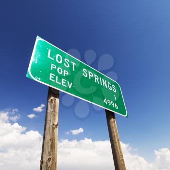 Royalty Free Photo of a Population and Elevation Sign for Lost Springs, Wyoming
