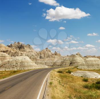 Royalty Free Photo of a Scenic Roadway in Badlands National Park, North Dakota