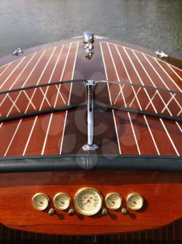 Royalty Free Photo of a Detail of a Wooden Boat Dashboard and Windshield