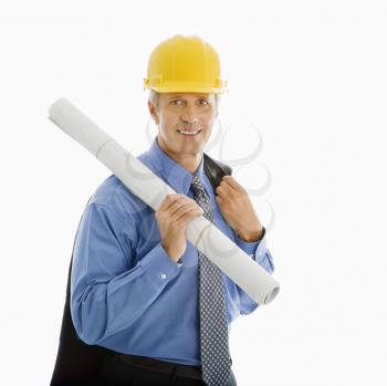 Royalty Free Photo of a Middle-Aged Businessman Holding Blueprints and Wearing a Hard Hat
