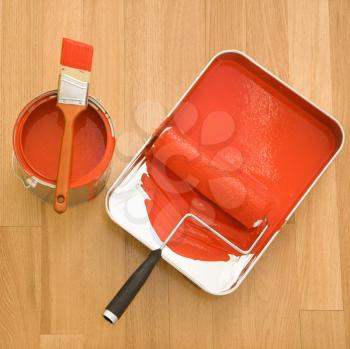 Royalty Free Photo of Painting Supplies on a Wood Floor
