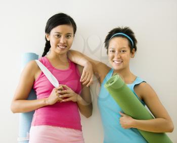 Royalty Free Photo of Women Standing in Workout Clothes Smiling