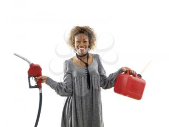 Royalty Free Photo of a Woman Holding a Fuel Pump Nozzle and Gas Storage Container