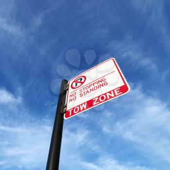Royalty Free Photo of a No Parking Tow Zone Street Sign