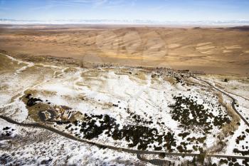 Royalty Free Photo of an Aerial Landscape of Snowy Plains and Dunes in Great Sand Dunes National Park, Colorado