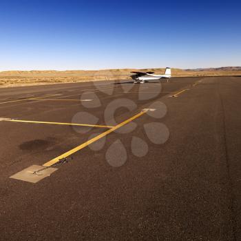 Royalty Free Photo of a Plane Parked on Tarmac at Canyonlands Field Airport, Utah, United States