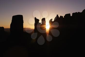 Royalty Free Photo of a Scenic sunset landscape of mesas in Monument Valley near the border of Arizona and Utah, United States