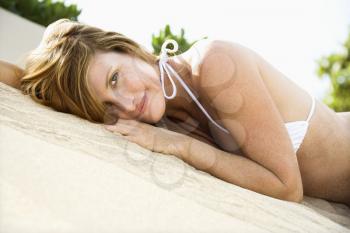 Royalty Free Photo of a Woman Lying on the Beach
