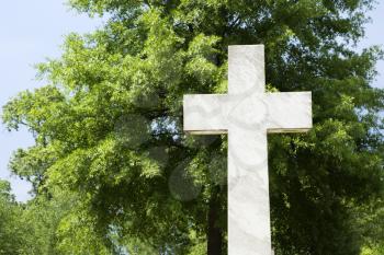 Royalty Free Photo of a Cross in a Graveyard