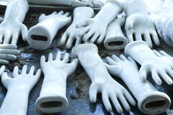 Royalty Free Photo of a Table Full of Ceramic Hand Figurines