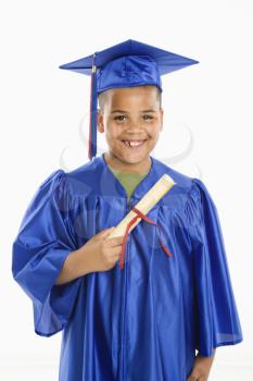 Royalty Free Photo of a Young Boy Wearing a Blue Graduation Gown and Holding a Diploma