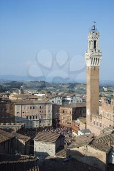 High angle view of Piazza del Campo and surrounding buildings in Siena, Italy. Vertical shot.