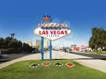 Welcome to Fabulous Las Vegas Nevada sign with urban buildings in background. Horizontally framed shot.