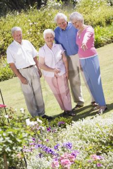 Royalty Free Photo of Seniors in a Flower Garden