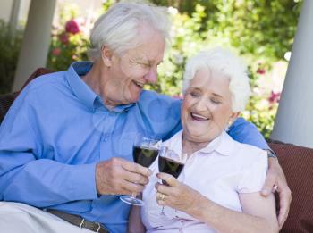 Royalty Free Photo of a Senior Couple Having a Glass of Wine