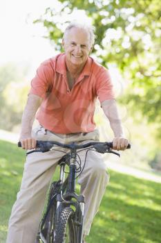 Royalty Free Photo of a Man on a Bicycle