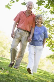 Royalty Free Photo of a Senior Couple Walking