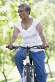 Royalty Free Photo of a Senior Woman on a Bicycle