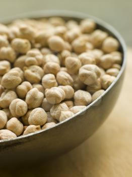Royalty Free Photo of a Bowl of Uncooked Chickpeas