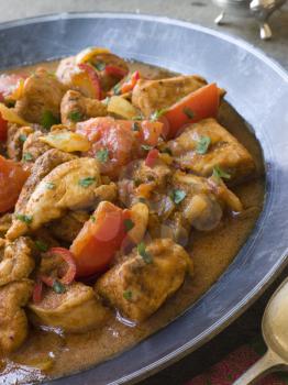 Royalty Free Photo of Chicken Bhoona in a Pewter Dish