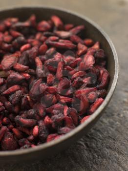 Royalty Free Photo of a Dish of Dried Pomegranate Seeds