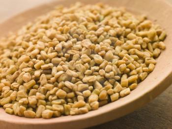 Royalty Free Photo of a Dish of Whole Fenugreek