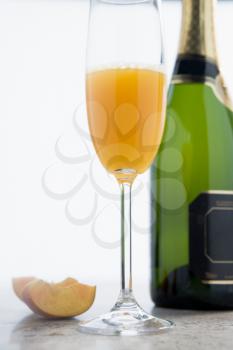 Royalty Free Photo of a Glass of Peach Bellini