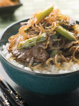 Royalty Free Photo of Sweet Soy Beef Fillet With Shirataki Noodles on Rice