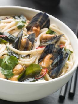 Royalty Free Photo of Mussels and Udon Noodles in Chili Soy Broth