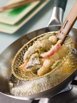 Royalty Free Photo of Cooking Tempura Of Vegetables in a Wok