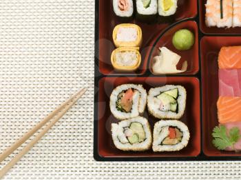 Royalty Free Photo of  a Selection of Sushi in a Bento Box